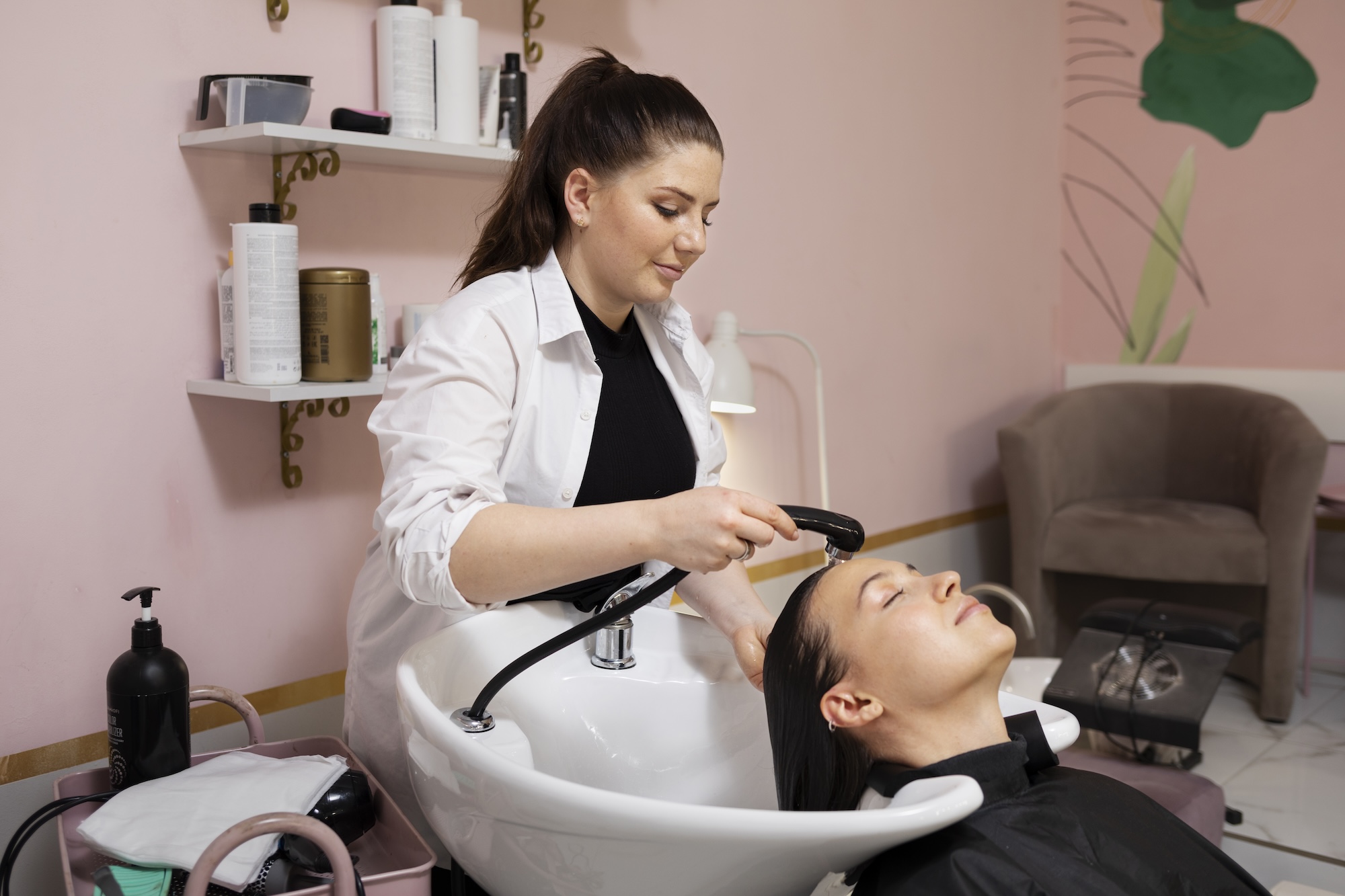 woman getting treatment hairdresser shop